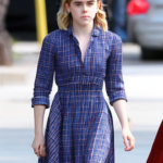 Kiernan Shipka barefoot wearing a plaid dress