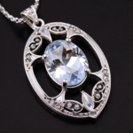 best quality, 4k, best lighting, best shadows, intricate details, silver filigree oval-shaped pendant with clear quartz crystal gem navette cut, front view, direct center