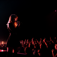 Shadowy Taylor Swift worshipping satan