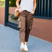 45 year old woman light brown hair REI cargo pants tank top