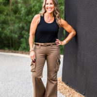 45 year old woman light brown hair REI cargo pants tank top